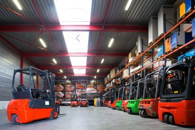 55128-forklift-machinery-in-a-row-in-warehouse-2022-03-04-02-38-51-utc-scaled.jpg