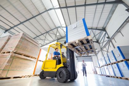 businessman-supervising-forklift-truck-driver-work-2026-03-26-08-25-08-utc.jpg